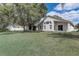 Large backyard with mature trees and plenty of space to entertain or relax at 19540 Glen Elm Way, Orlando, FL 32833