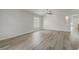 Inviting living room showcasing light-colored floors, neutral walls, and generous natural light at 19540 Glen Elm Way, Orlando, FL 32833