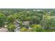 Aerial shot exhibiting the property nestled amidst a verdant landscape, providing a sense of peaceful seclusion at 2123 Weber St, Orlando, FL 32803