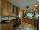 Updated kitchen with granite countertops, stainless steel appliances, and custom cabinetry at 2123 Weber St, Orlando, FL 32803