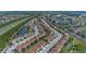 Aerial view of a well-maintained community with green spaces and roadways at 2447 Hassonite St, Kissimmee, FL 34744