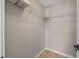 Walk-in closet with a light wood floor and wire shelving for storage at 2447 Hassonite St, Kissimmee, FL 34744