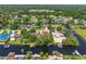 Aerial view of a charming waterfront property with a boat dock and beautiful surroundings at 2491 Island Dr, Longwood, FL 32779