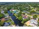 Beautiful aerial shot of a waterfront neighborhood with a cozy home and stunning canal access at 2491 Island Dr, Longwood, FL 32779