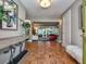 Inviting foyer with hardwood floors, ample natural light, views of living room at 2491 Island Dr, Longwood, FL 32779