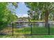 A serene waterfront view featuring a private boat dock and lush greenery, offering tranquil living at 2491 Island Dr, Longwood, FL 32779