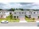 Beautiful two-story home featuring a covered front porch, a well-manicured lawn, and an attached two-car garage at 2841 Willowseed Ln, St Cloud, FL 34772