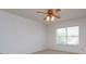 Spacious bedroom featuring a ceiling fan, window and neutral colors at 2903 Joseph Cir, Oviedo, FL 32765