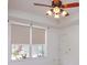 Bedroom featuring a window, ceiling fan, neutral color palette and an access door at 2903 Joseph Cir, Oviedo, FL 32765