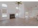Large living room featuring a fireplace, vaulted ceilings, and sliding glass door at 2903 Joseph Cir, Oviedo, FL 32765