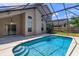 A screened in pool with a view of the house at 2903 Joseph Cir, Oviedo, FL 32765