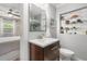 Nicely appointed bathroom sink with glass shelving in the background, next to the bedroom at 2918 Wessex St, Orlando, FL 32803