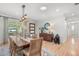 Bright dining room with natural light, wooden table, and stylish decor elements at 2918 Wessex St, Orlando, FL 32803