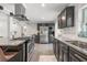 Well-appointed kitchen showcasing granite countertops, stainless appliances, and ample cabinet space at 2918 Wessex St, Orlando, FL 32803