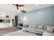 Spacious living room featuring a sectional sofa, stylish lighting, and seamless flow into the dining area at 2918 Wessex St, Orlando, FL 32803