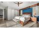 Elegant main bedroom features a king bed, built-in wooden accents, and a serene ambiance at 2918 Wessex St, Orlando, FL 32803