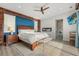 Luxurious main bedroom with a statement wall, fireplace, en-suite bathroom access, and stylish furnishings at 2918 Wessex St, Orlando, FL 32803