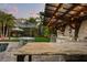 The outdoor kitchen is perfect for entertaining with a granite countertop and bar seating at 2918 Wessex St, Orlando, FL 32803
