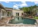 Inviting swimming pool surrounded by lush landscaping and a well-maintained patio, creating a private oasis at 2918 Wessex St, Orlando, FL 32803