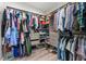 Spacious walk-in closet featuring built-in shelving, drawers, and ample storage for clothing and shoes at 2918 Wessex St, Orlando, FL 32803