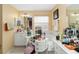Bright bathroom with decorative elements, a window, and tub at 294 Hunt St, Clermont, FL 34711