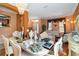 Elegant dining room featuring decorative chandelier, neutral walls, hardwood floors and formal dining set at 294 Hunt St, Clermont, FL 34711