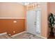 Warm and inviting foyer with decorative accents and tile flooring at 294 Hunt St, Clermont, FL 34711