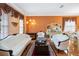 Elegant living room featuring hardwood floors, decorative curtains and ornate furniture at 294 Hunt St, Clermont, FL 34711