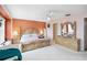 Spacious main bedroom with decorative furnishings, carpeted floors, and ample natural light at 294 Hunt St, Clermont, FL 34711