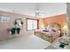 Large main bedroom with an ornamental bed frame, and natural light at 294 Hunt St, Clermont, FL 34711