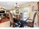 Open dining area with access to the backyard, seamlessly connected to the living space at 3842 Klondike Pl, Sanford, FL 32771