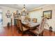 Comfortable dining area with hardwood floors, perfect for Gathering meals and entertaining guests at 3842 Klondike Pl, Sanford, FL 32771
