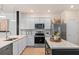 Clean kitchen showcasing stainless steel appliances, countertops and ample cabinet space at 393 Meadowland Pt, Oviedo, FL 32765