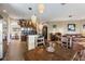 Open concept living and dining area with tile floors, great light, and an attached kitchen at 4813 River Gem Ave, Windermere, FL 34786