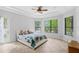 Spacious main bedroom features a tray ceiling and multiple windows that bring in natural light at 549 Wellon Ave, Orlando, FL 32833