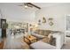 Spacious living room with vaulted ceilings, wood beams, and neutral tones creating a warm atmosphere at 620 Fruitwood Ave, Winter Springs, FL 32708