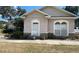 Close-up view showcasing the architectural detailing including decorative windows at 6438 Bristol Oaks Dr, Lakeland, FL 33811