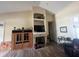 Bright living room with a decorative fireplace and vaulted ceilings at 6438 Bristol Oaks Dr, Lakeland, FL 33811