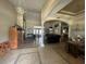 Spacious living room featuring tile floors and arched entryways, perfect for entertaining at 6438 Bristol Oaks Dr, Lakeland, FL 33811