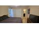 Comfortable bedroom with a large closet and view to the bathroom at 7600 Skyview Dr, Orlando, FL 32809
