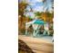 Private poolside cabana with comfortable loungers offers a shady retreat for relaxation and leisure at 8045 Lost Shaker Ln, Kissimmee, FL 34747