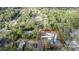 Aerial view showing property lines, surrounding neighborhood, pool, and landscaping at 817 Helen Ave, Deland, FL 32720