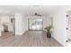 Bright room featuring large windows and sliding glass doors at 817 Helen Ave, Deland, FL 32720