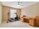 Bright bedroom with modern exercise equipment and a stylish desk setup at 939 Glen Abbey Cir, Winter Springs, FL 32708