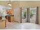 Bright eat-in kitchen with tile floors, granite countertops, and stainless steel appliances at 939 Glen Abbey Cir, Winter Springs, FL 32708