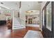 Grand foyer with soaring ceilings, hardwood floors, staircase, and chandelier, creating an inviting entry at 108 Sagecrest Dr, Ocoee, FL 34761