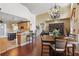 Open floor plan with a seamless flow between the kitchen, dining area, and living room for easy entertaining at 108 Sagecrest Dr, Ocoee, FL 34761