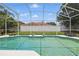 Enclosed pool with clear water and a manicured yard, ideal for relaxation and summer enjoyment at 108 Sagecrest Dr, Ocoee, FL 34761