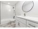Stylish bathroom featuring a shower-tub combination and a vanity with modern fixtures at 1105 Valencia Ave, Haines City, FL 33844
