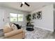Comfortable living room showcasing a cozy sofa, decorative pillows, and a patterned rug enhancing the ambiance at 1105 Valencia Ave, Haines City, FL 33844